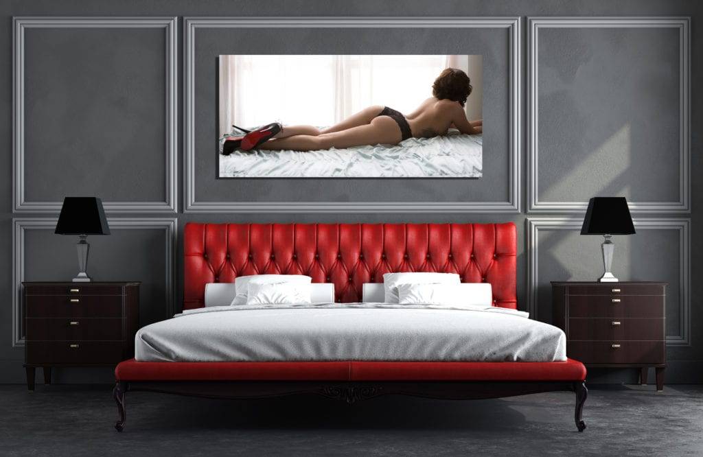 Boudoir photo as wall art above a bed
